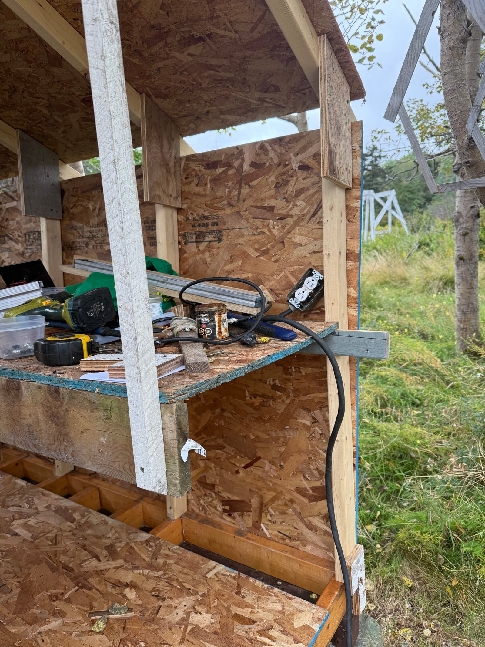 Inside the Cove workshop, with the bench and tools being set up for Franky’s CNC workspace.